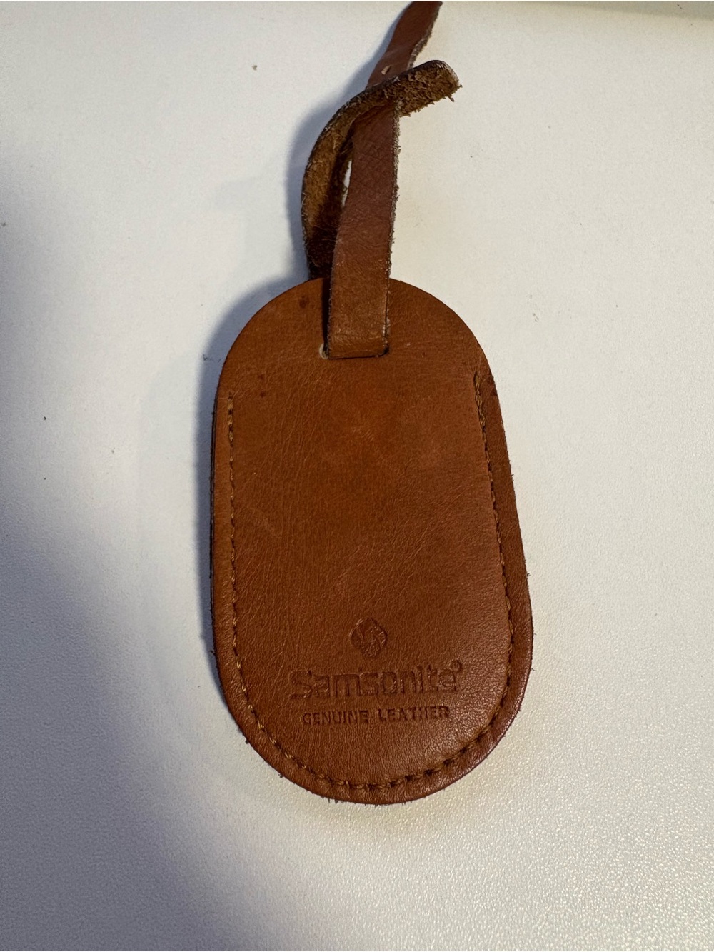 Samsonite Brown Leather Oval Luggage Tag with Strap